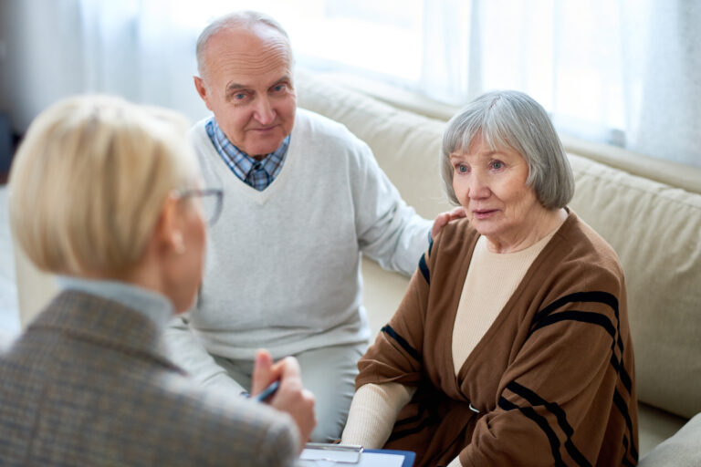 an-in-home-physical-therapist-helping-patients-with-paperwork-and-funding