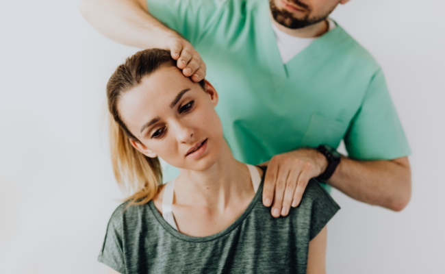 Gentle head and neck massage provided during vestibular physiotherapy in Edmonton