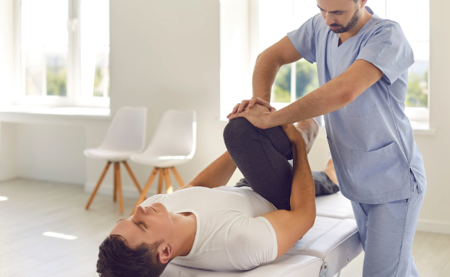 Knee mobility treatment provided during an in-home physiotherapy visit in Edmonton