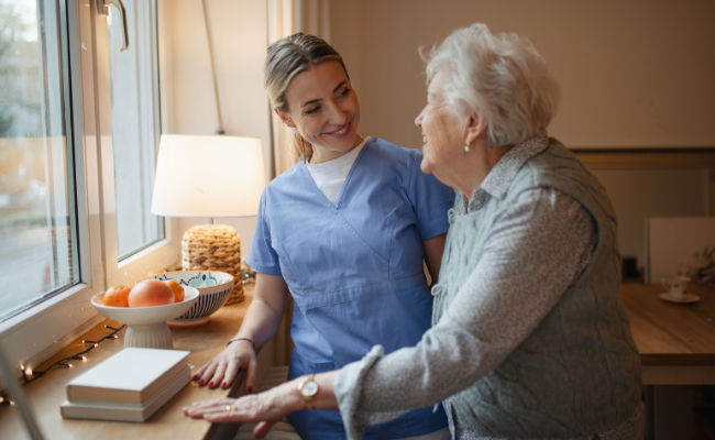 A physiotherapist provides in-home support and guidance to a senior in Surrey
